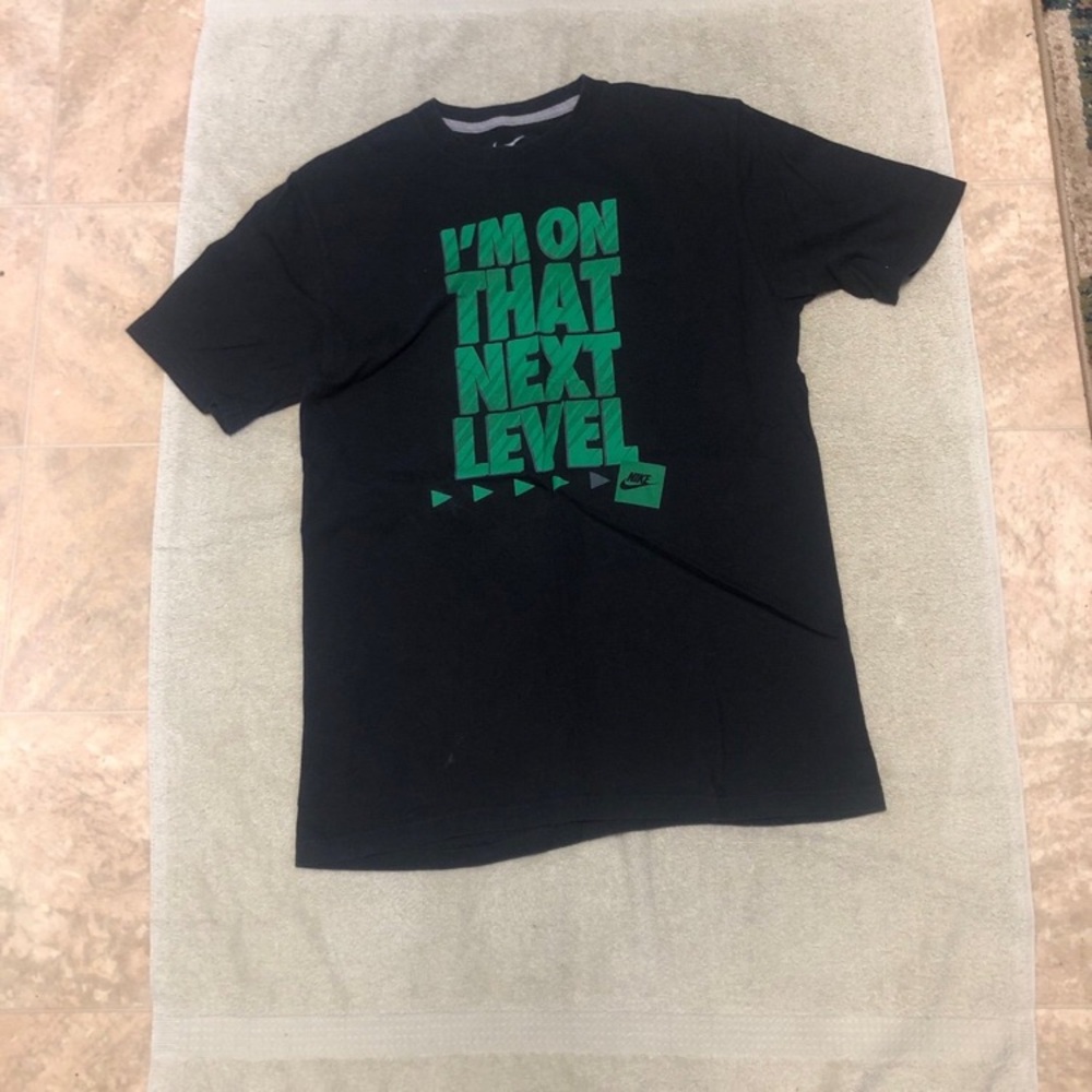 Nike Men's Black Tee with Green Graphic